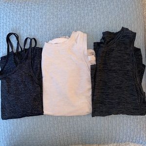 Three woman’s workout tank tops